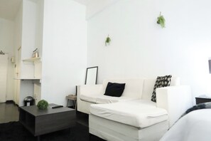 Appartement Deluxe | Coin séjour | Télévision à écran plat