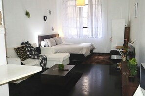 Appartement Deluxe | Coin séjour | Télévision à écran plat