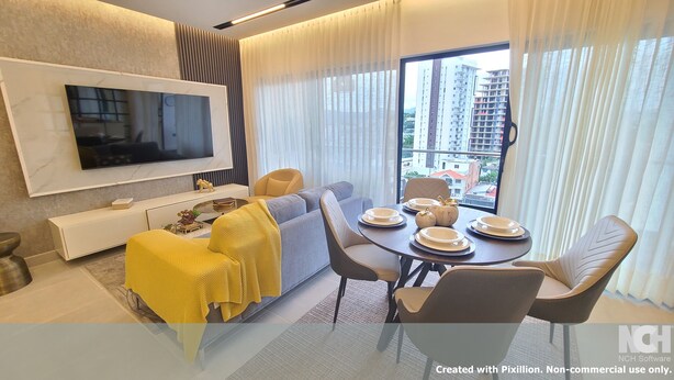 A modern living room with a flat-screen TV, sofa, dining table, and chairs.