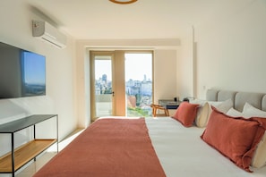 1 bedroom, desk, iron/ironing board, travel crib
