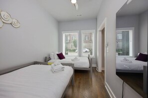 4 bedrooms, desk, iron/ironing board, travel cot