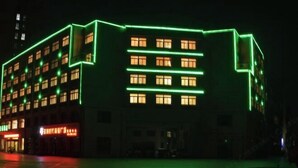 A building with multiple floors and a flat roof, featuring a series of windows on each level. - GreenTree (Shuyang Development Zone Yingbin Avenue) (Shuyang)