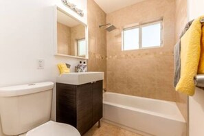 Hair dryer, towels, soap, toilet paper