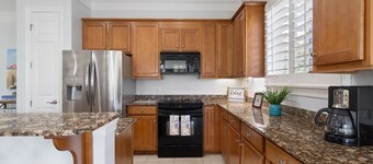 Ground floor condo at Peninsula. Coastal living with golf course views!