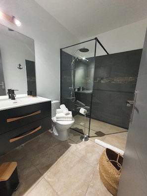 Shower, hair dryer, towels, soap