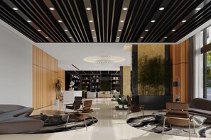 A modern lobby with a reception desk, seating area, and a large window. - Yi Qiao Hotel (Chengdu)