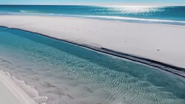 A beach with clear water and a white sand shore. - Gulf Access Getaway in Punta Gorda (Punta Gorda)