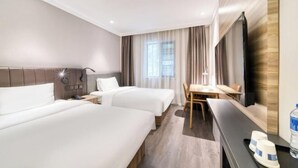 A hotel room with two beds, a desk, a chair, a TV, and a large window with curtains. - HanTing Hotel (Jiaxing Nanhu Yaohan Shopping Mall Area) (Jiaxing)