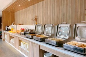 A buffet with multiple food stations, including a variety of dishes and beverages. - HanTing Hotel (Jiaxing Nanhu Yaohan Shopping Mall Area) (Jiaxing)