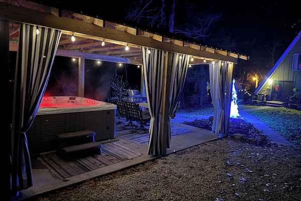 Covered hot tub house for all season hot tub use, just steps aways for the lodge