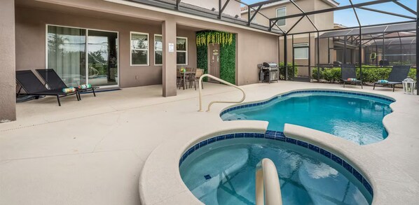 Indoor pool, a heated pool - Spacious 5BR 4.5BA Home w/ Pool (Davenport)