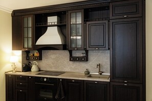 Private kitchen - One-of-a-kind apartment seamlessly blends antique elegance with modern comfort. (Varna)