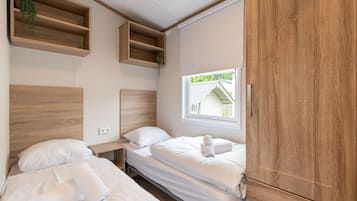 Chalet | 2 dormitorios y ropa de cama