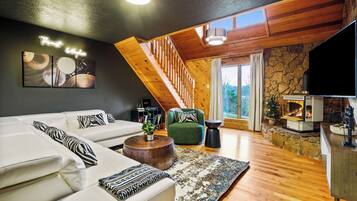 Smart TV, fireplace, foosball, books