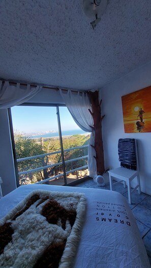 Design tweepersoonskamer, uitzicht op het strand | Individueel gedecoreerd, beddengoed