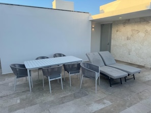 Outdoor dining - Stylish / Cozy / Heart of Aldea Zama / Brand New / Boutique / Luxury / Spacious  (Tulum)