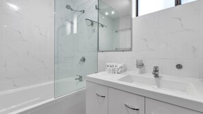 Shower, towels, toilet paper