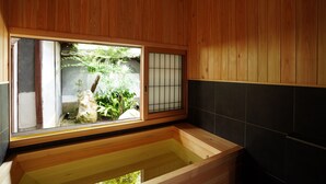 A wooden room with a large window, a wooden bathtub, and a tiled wall. - NIPPONIA HARIMA FUKUSAKI ZOUSHONO YAKATA (Fukusaki)