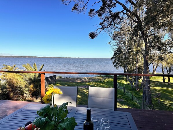 Outdoor dining - Perfect Retreat Absolute waterfront, Stunning View and Direct Access to water.  (Gorokan)