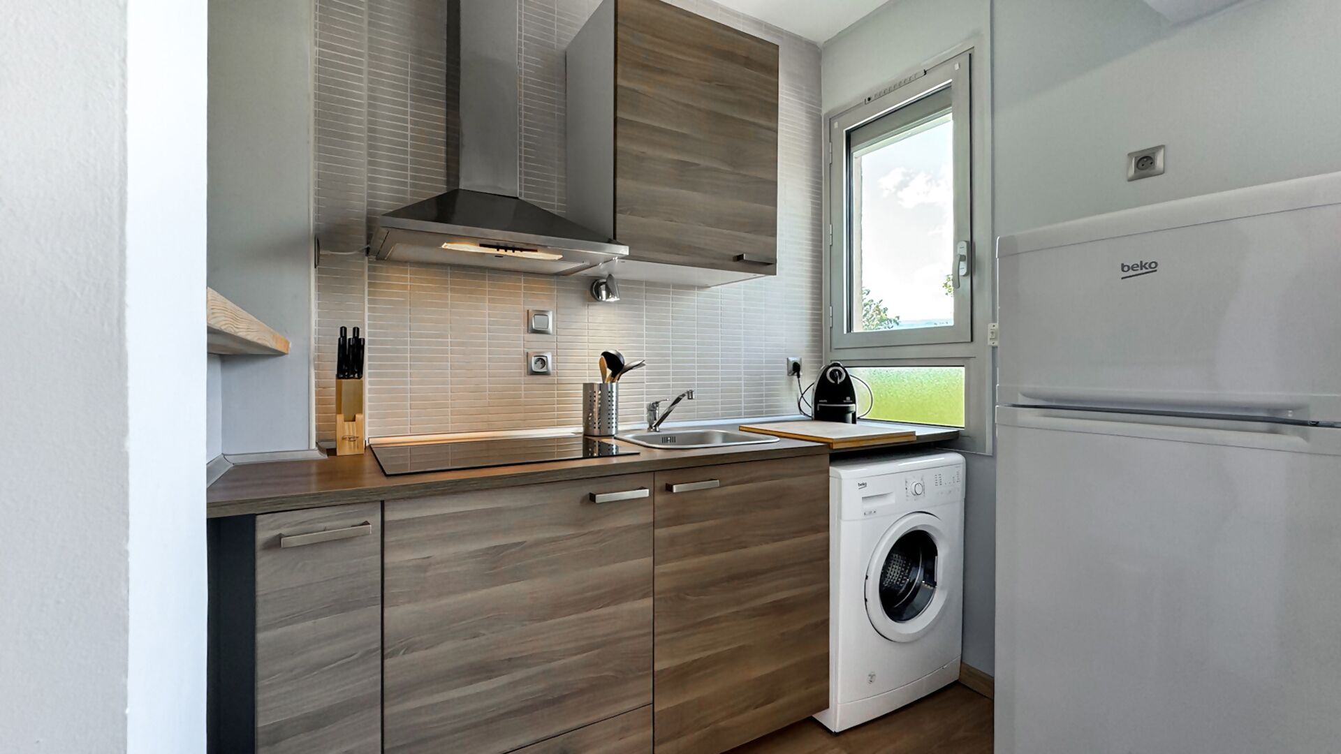 Fridge, toaster, cookware/dishes/utensils, dining tables