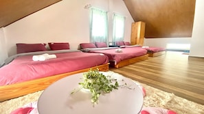 Family Triple Room | Desk, laptop workspace, soundproofing, iron/ironing board - Ruby Peace Hotel (Da Lat)