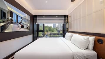 Premium bedding, down comforters, memory foam beds, free minibar