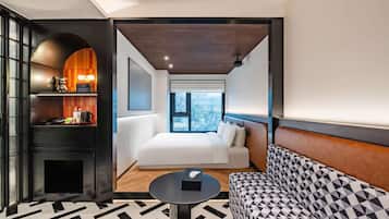 Kamar Eksklusif | Seprai premium, selimut bulu angsa, busa memori, dan minibar gratis