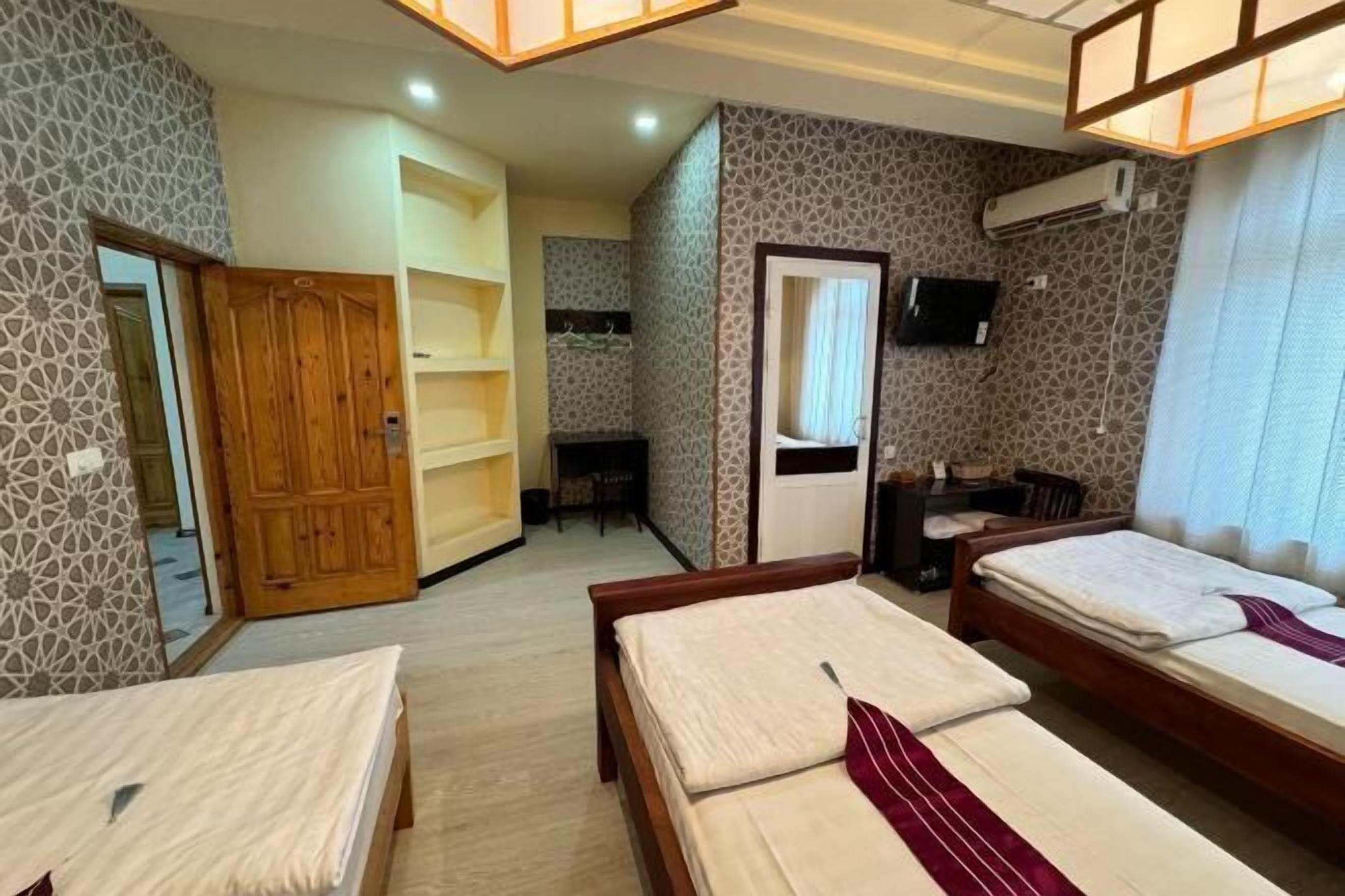 Premium bedding, desk, laptop workspace, soundproofing