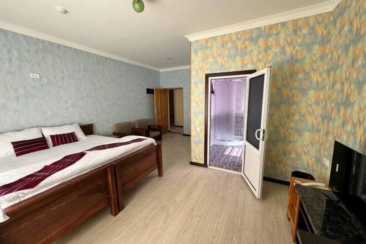 Premium bedding, desk, laptop workspace, soundproofing