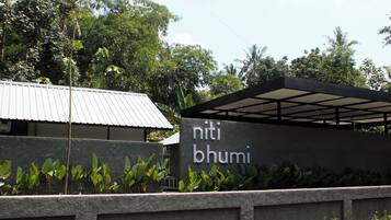 A building with a sign that reads "niti bhumi".