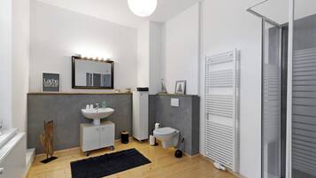 Shower, hair dryer, towels