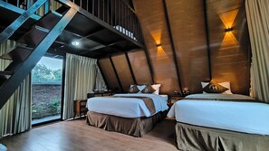 A modern hotel room with two beds, wooden ceiling beams, and a large window overlooking a garden. - Harmony Magelang Syariah (Mertoyudan)