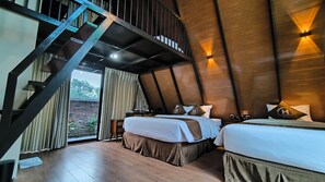 A modern bedroom with two beds, a wooden ceiling, and a staircase. - Harmony Magelang Syariah (Mertoyudan)