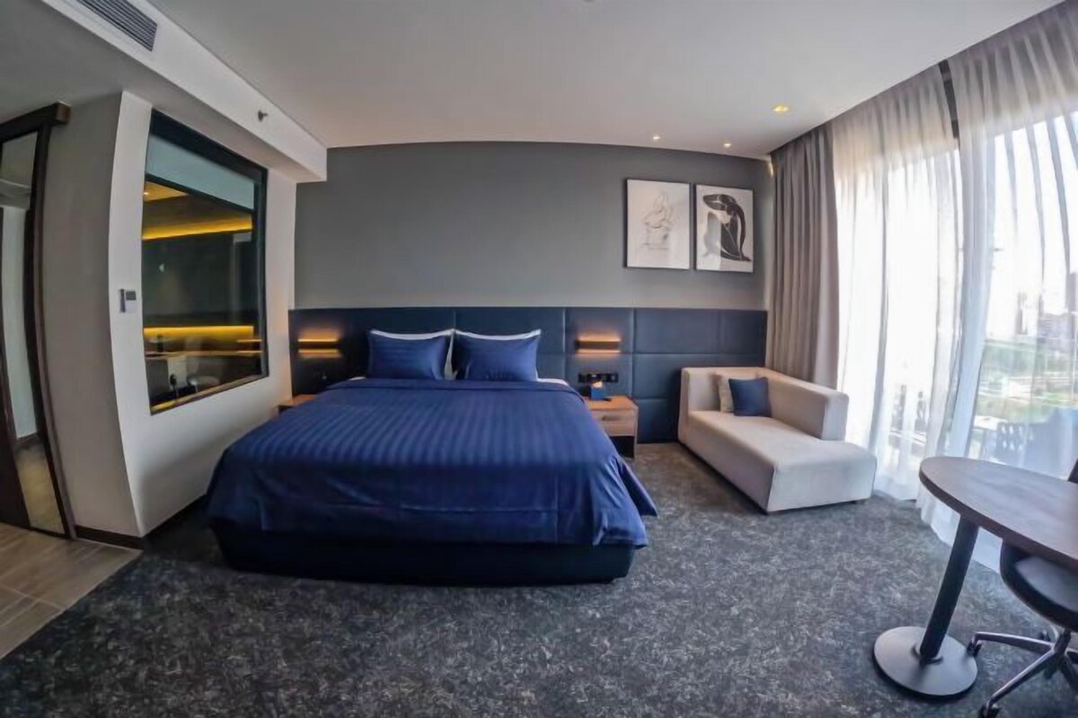 In-room safe, desk, laptop workspace, blackout curtains