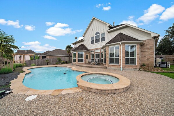 Outdoor pool - Houston Lake Retreat | Pool + Lake Front + Spa (Humble)