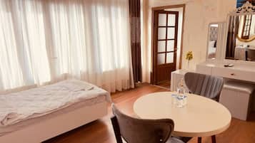 Family Twin Room, Balcony, City View | Desk, laptop workspace