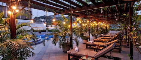 Outdoor pool, open 10:00 AM to 9:00 PM, free cabanas, sun loungers
