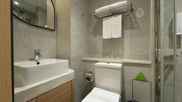 Shower, free toiletries, hair dryer, slippers