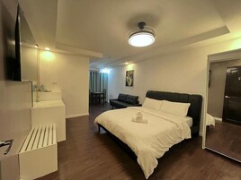 Premium Room | Living area | 50-inch Smart TV with digital channels, Netflix, streaming services