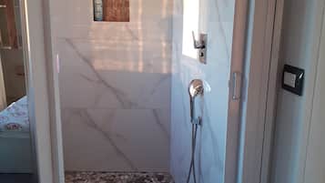 Hair dryer, towels, soap, shampoo