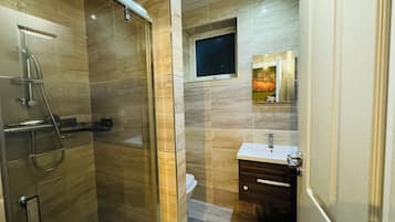 Hair dryer, towels, soap, toilet paper