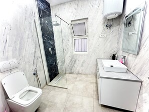Hair dryer, towels, soap, toilet paper