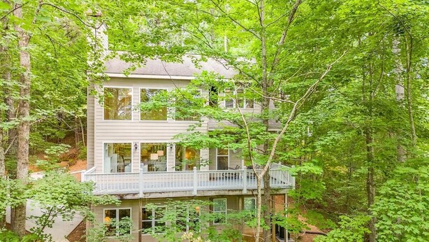 A multi-story house surrounded by dense forest. - Alpine Chalet| 5BR | Helen, GA| near golf| community pool (Helen)