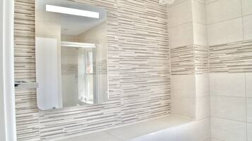 Eco-friendly toiletries, hair dryer, towels, soap