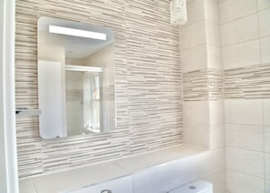Eco-friendly toiletries, hair dryer, towels, soap