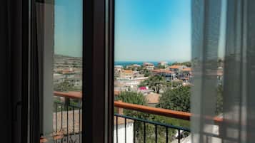 Quarto triplo superluxo, vista para o mar | Terraço/pátio