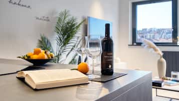 Deluxe Apartment | Living area | Flat-screen TV