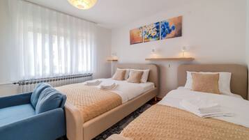 Family Apartment, 2 Bedrooms (Family Friendly Apartment With) | 2 bedrooms, in-room safe, laptop workspace, iron/ironing board