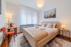 Family Apartment, Multiple Bedrooms (Family Friendly Apartment With) | 2 bedrooms, in-room safe, laptop workspace, iron/ironing board