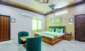 Deluxe Room | In-room safe, desk, blackout drapes, iron/ironing board - Treebo Ramayan Suites Ayodhya (Faizabad)